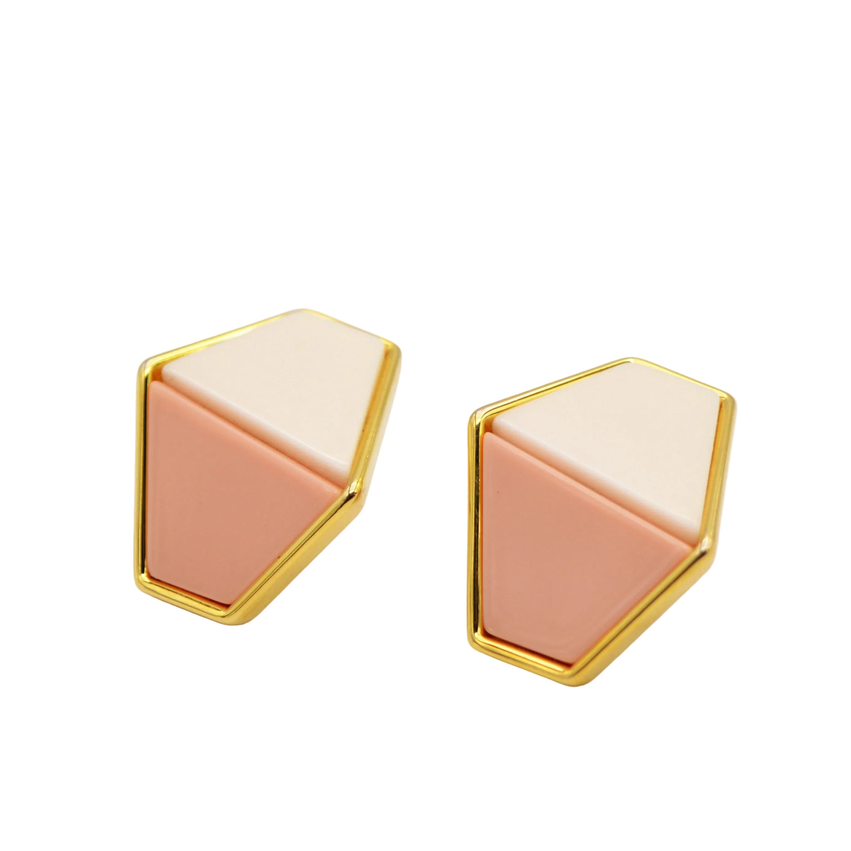 The Facet Studs, a pair of handcrafted, anti-tarnish stainless steel earrings featuring a soft, asymmetrical silhouette and two-tone enamel