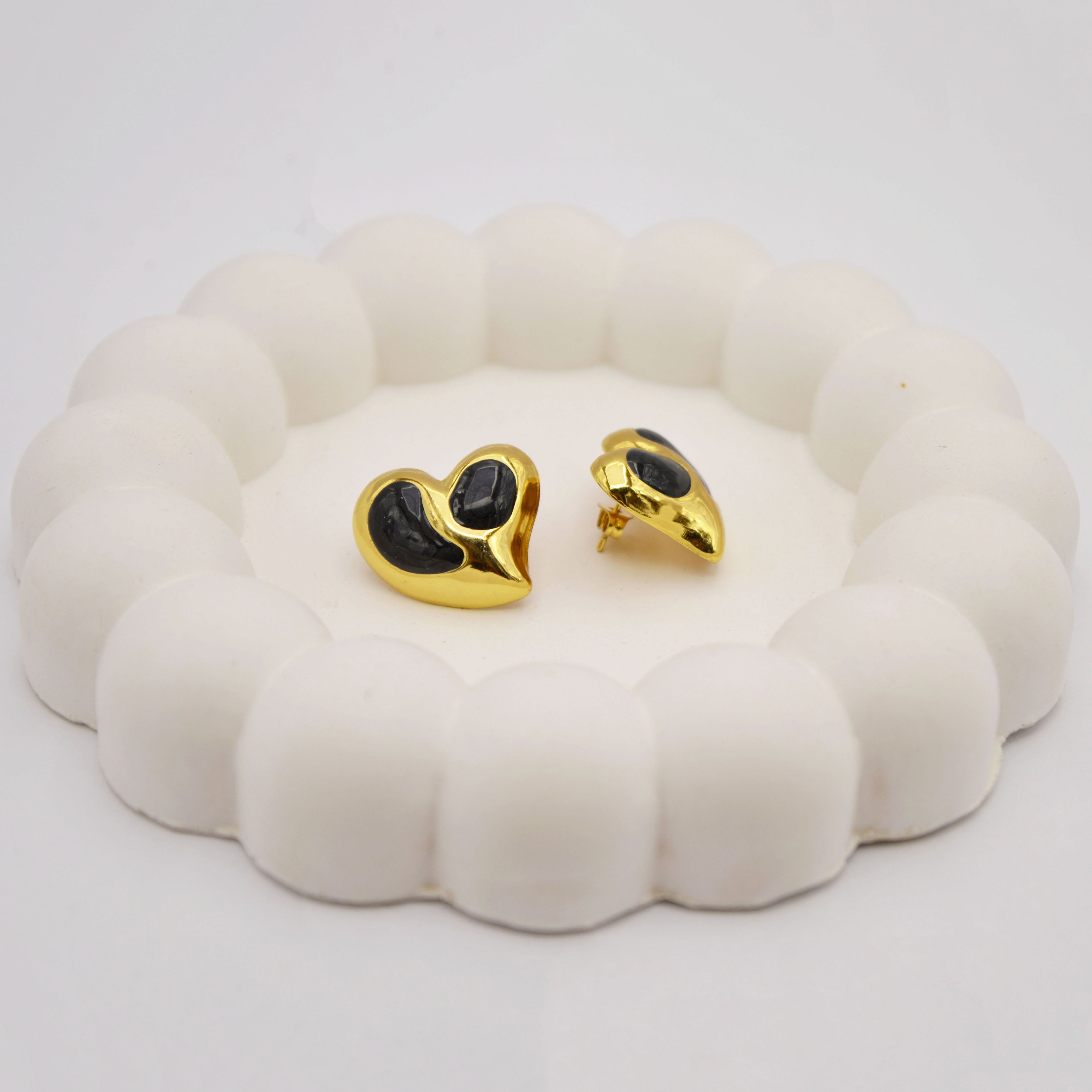 Close-up of the handcrafted, smooth metal contours and high-gloss enamel finish on The Soul Heart anti-tarnish studs