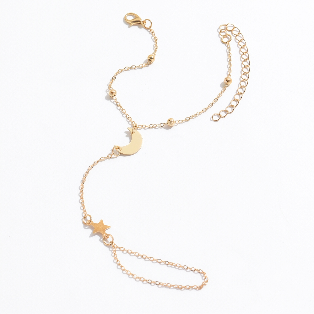 Adjustable moon and star hand bracelet with delicate chain