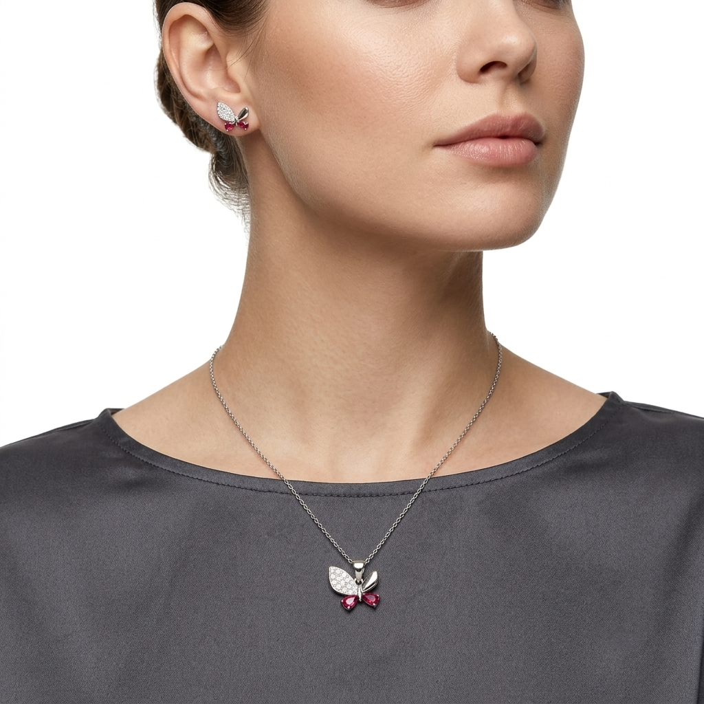 Butterfly pendant featuring pavé detailing and pink pear-cut stones