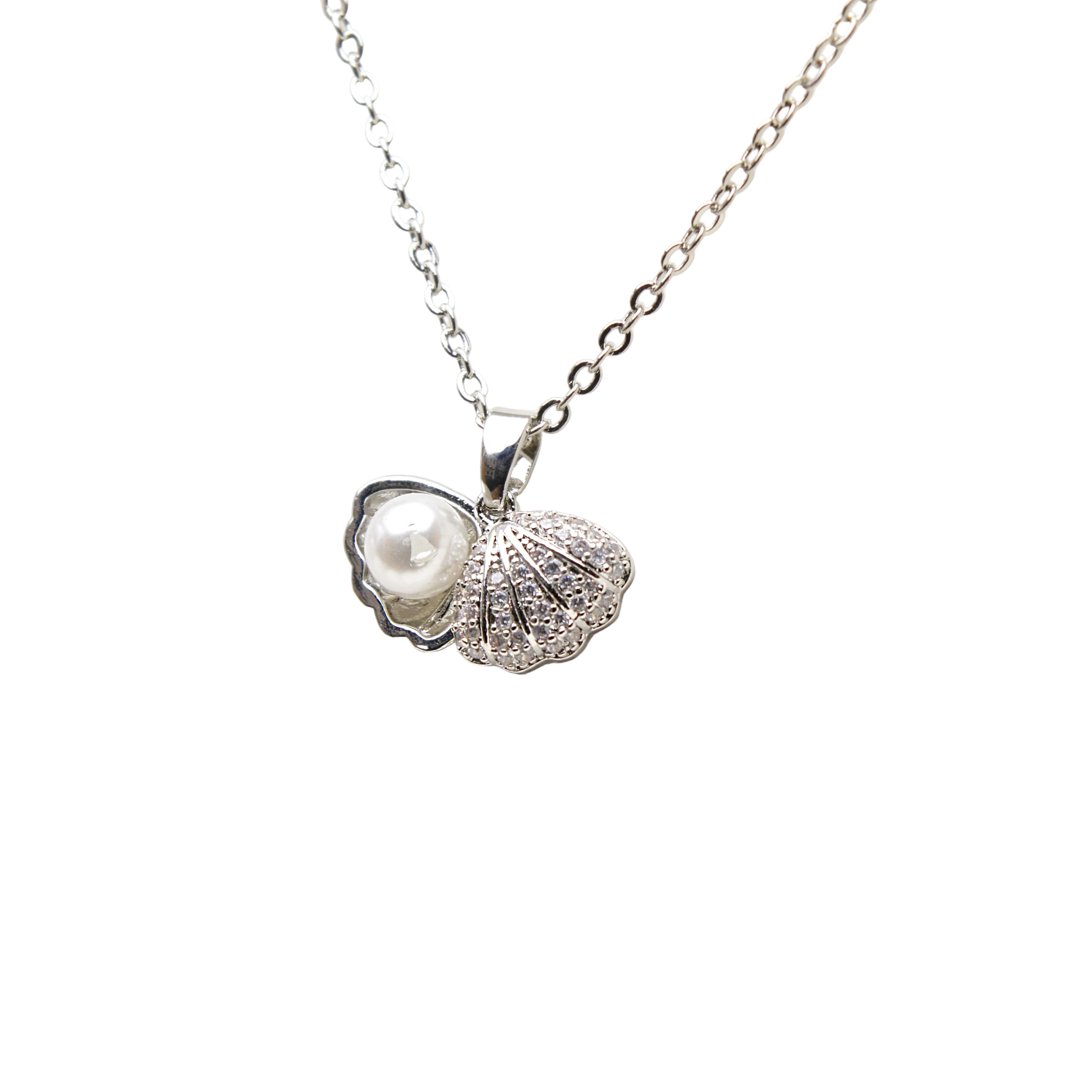 Dainty shell pendant necklace with pearl detail and sparkling stones