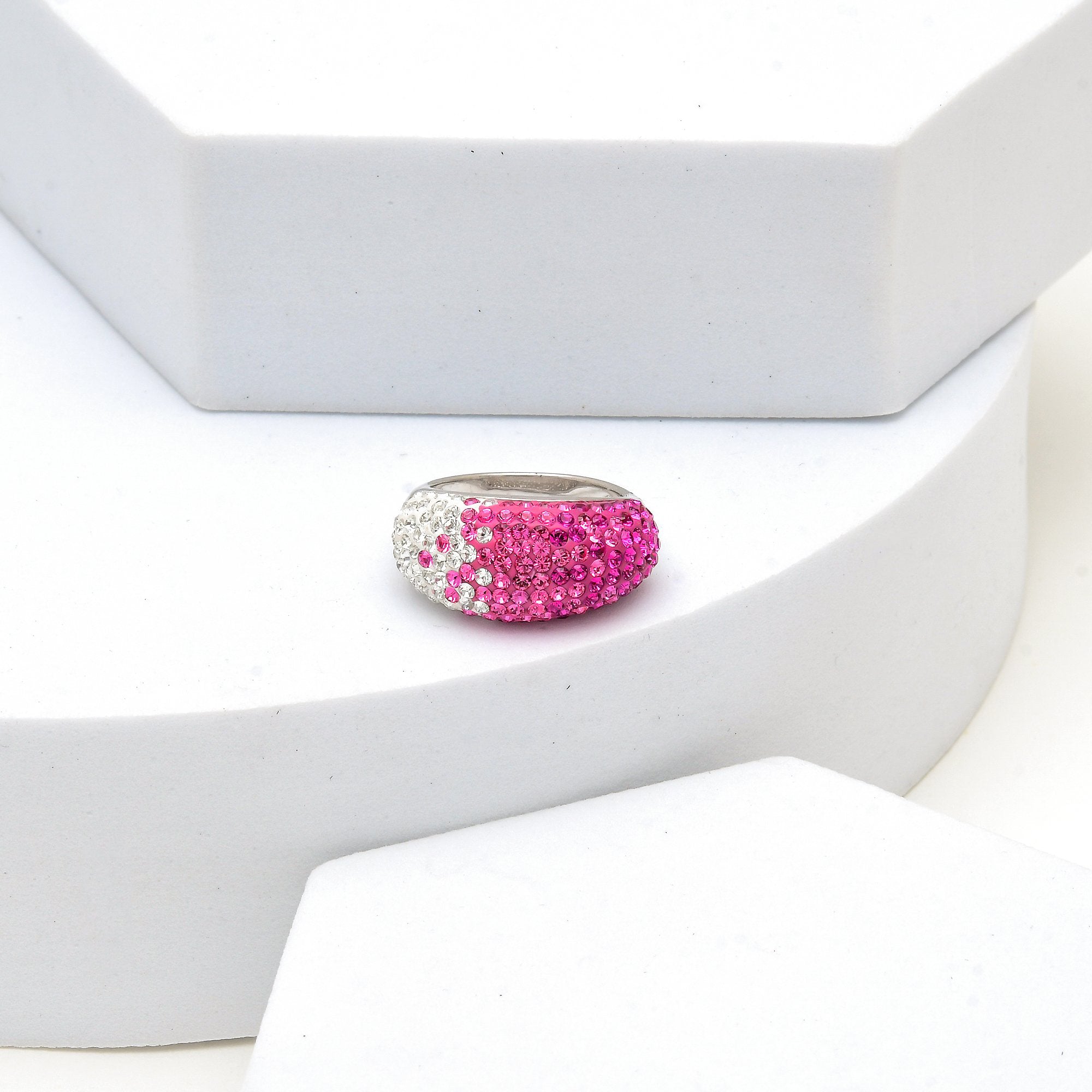 Profile shot of the Signature Fuchsia Ombré Dome ring highlighting the smooth, high-polish silver-tone frame and dome curvature