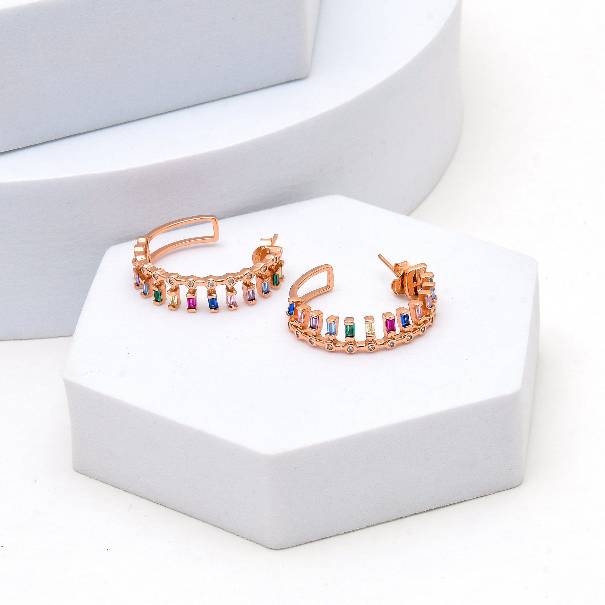 Elegant dual-tone hoop earrings with silver and rose gold contrast