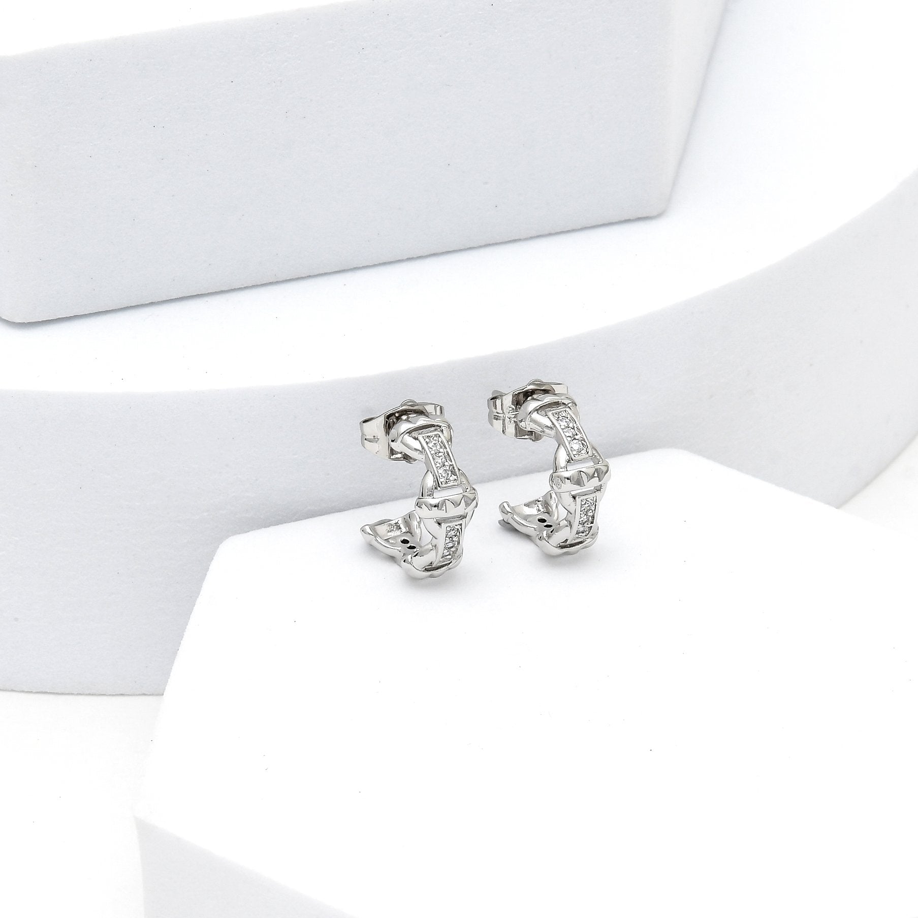 Close-up of skin safe minimal luxury hoop earrings for daily styling