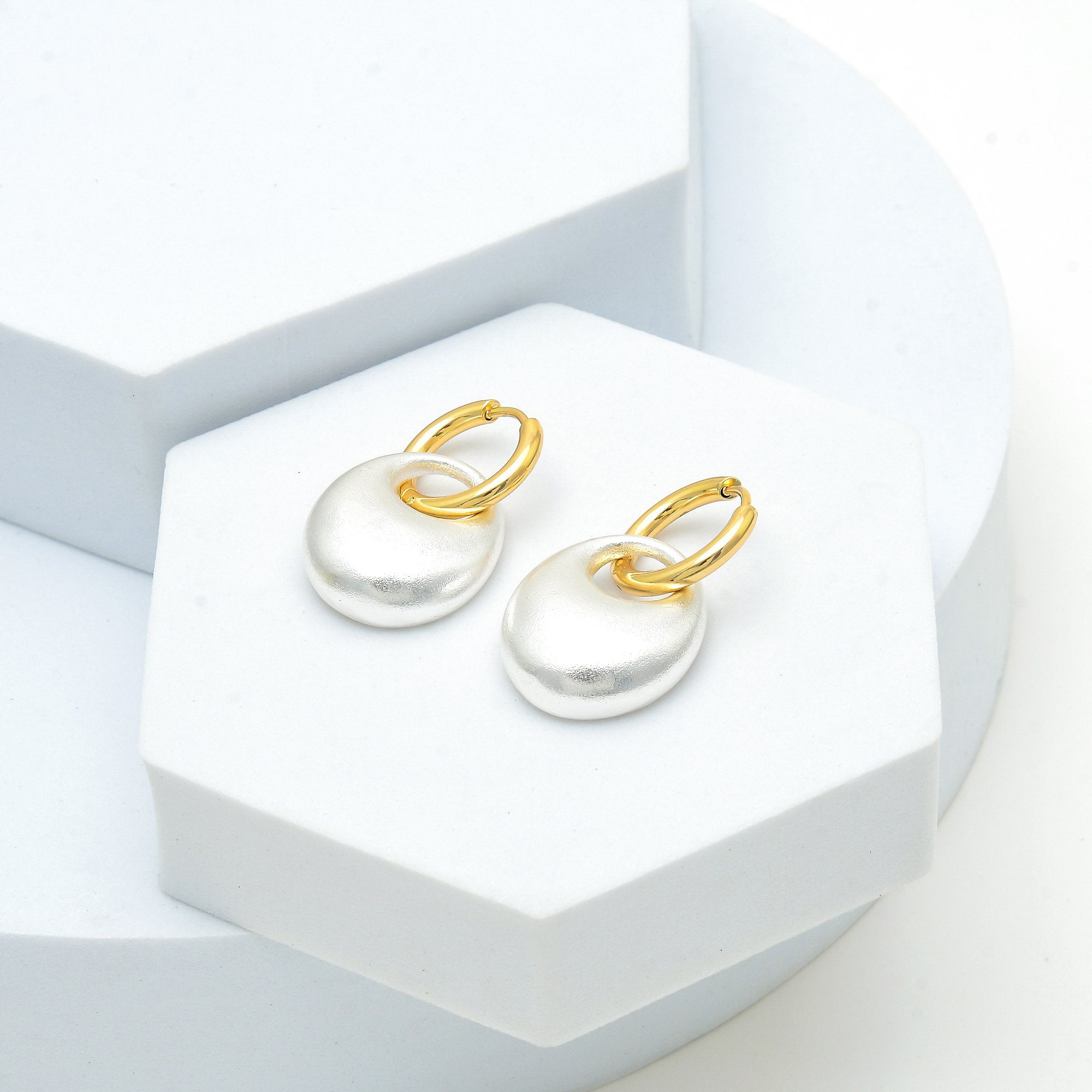Mixed metal hoop earrings with removable silver charm by Civaro
