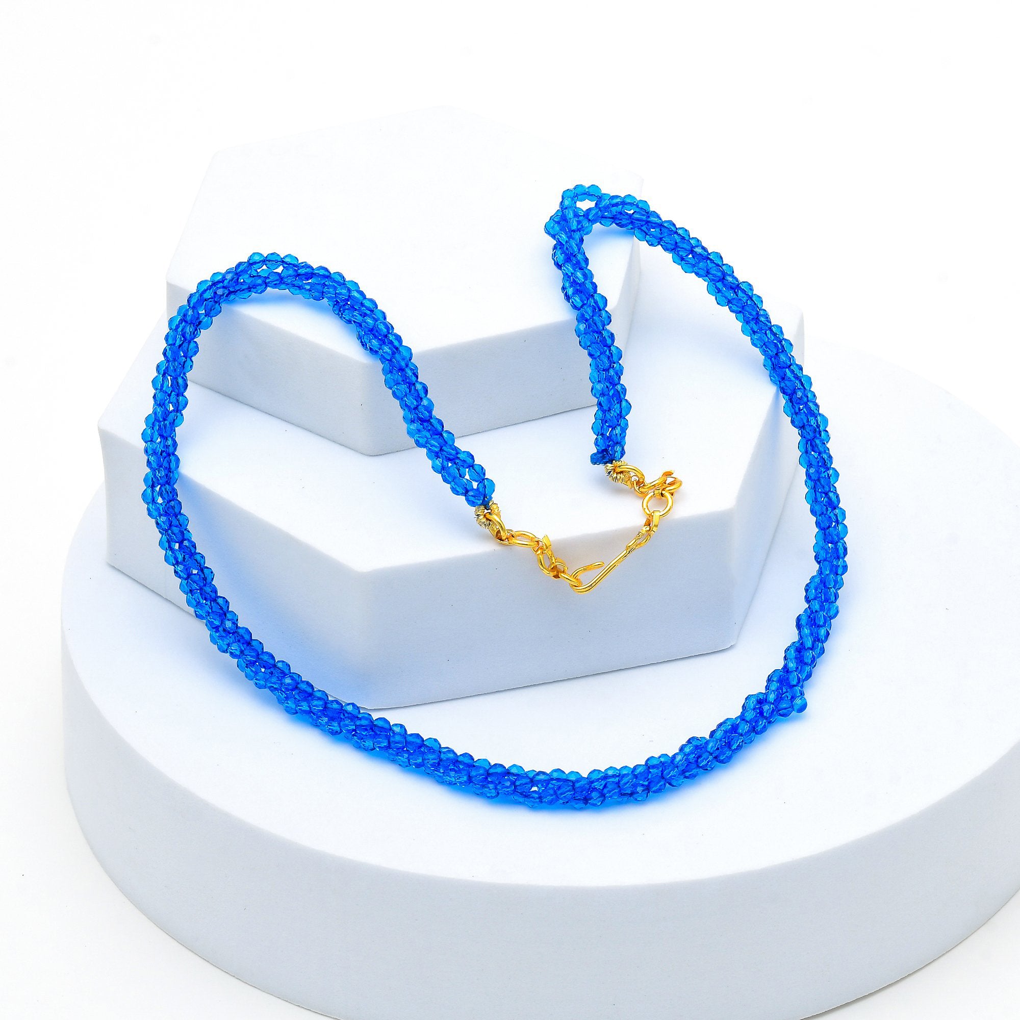 Modern crystal link necklace with vibrant blue artificial beads by Civaro