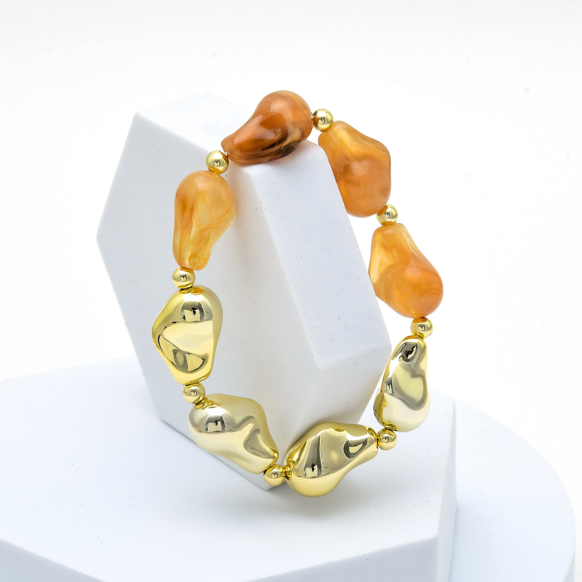 Orange amber acrylic bead bracelet featuring bold modern statement jewelry design by civaro