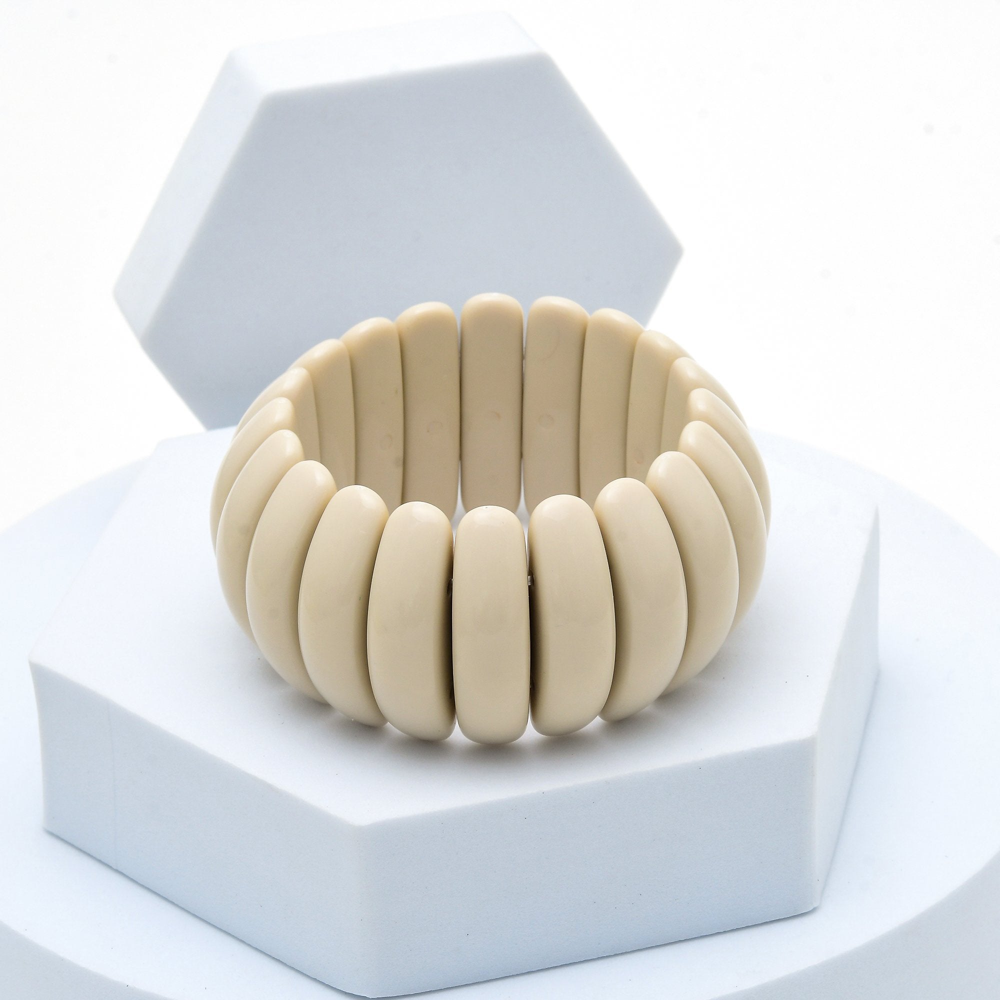 Neutral tone stretch bracelet with smooth segmented texture by Civaro