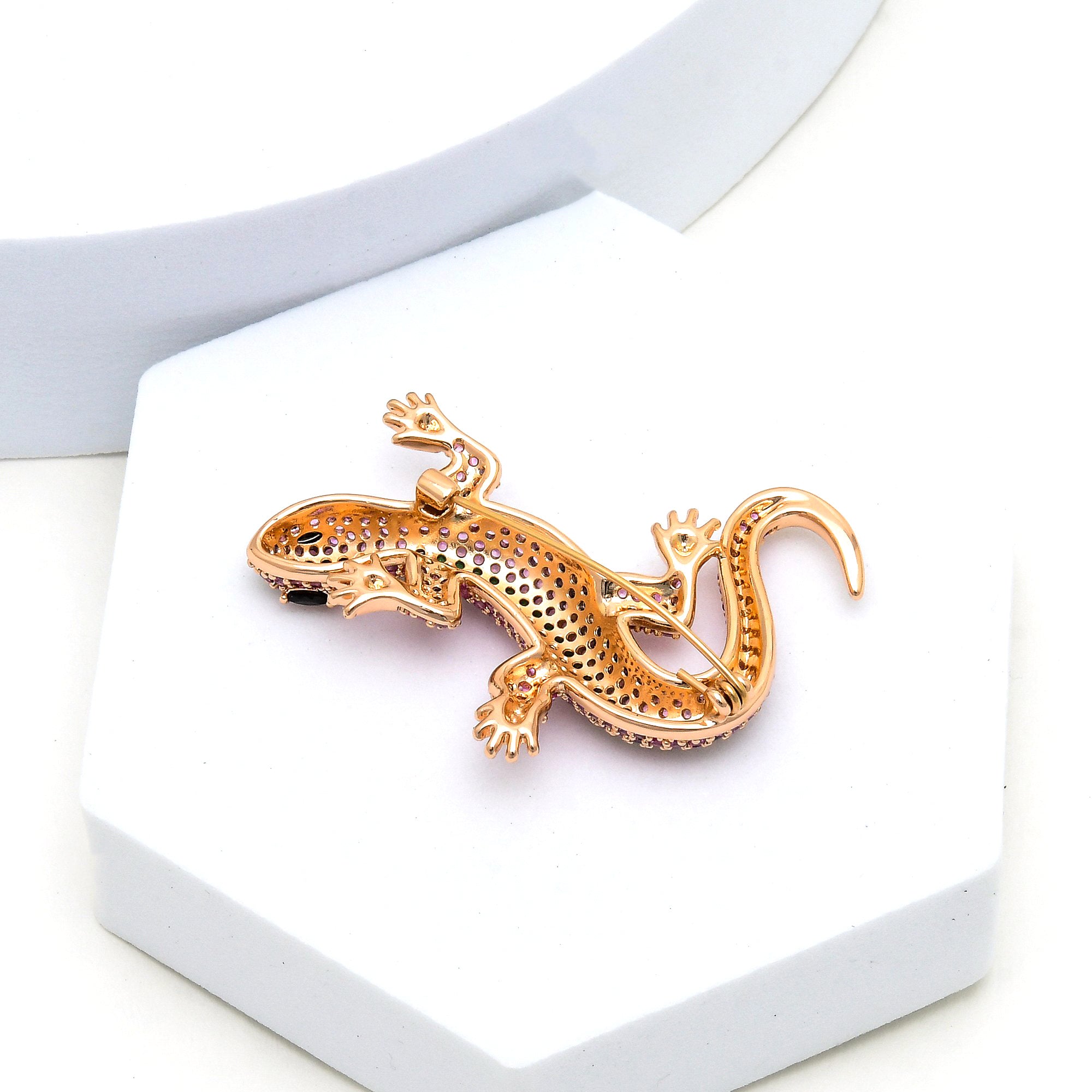     Statement animal brooch with detailed crystal pavé design and polished stainless steel finish.