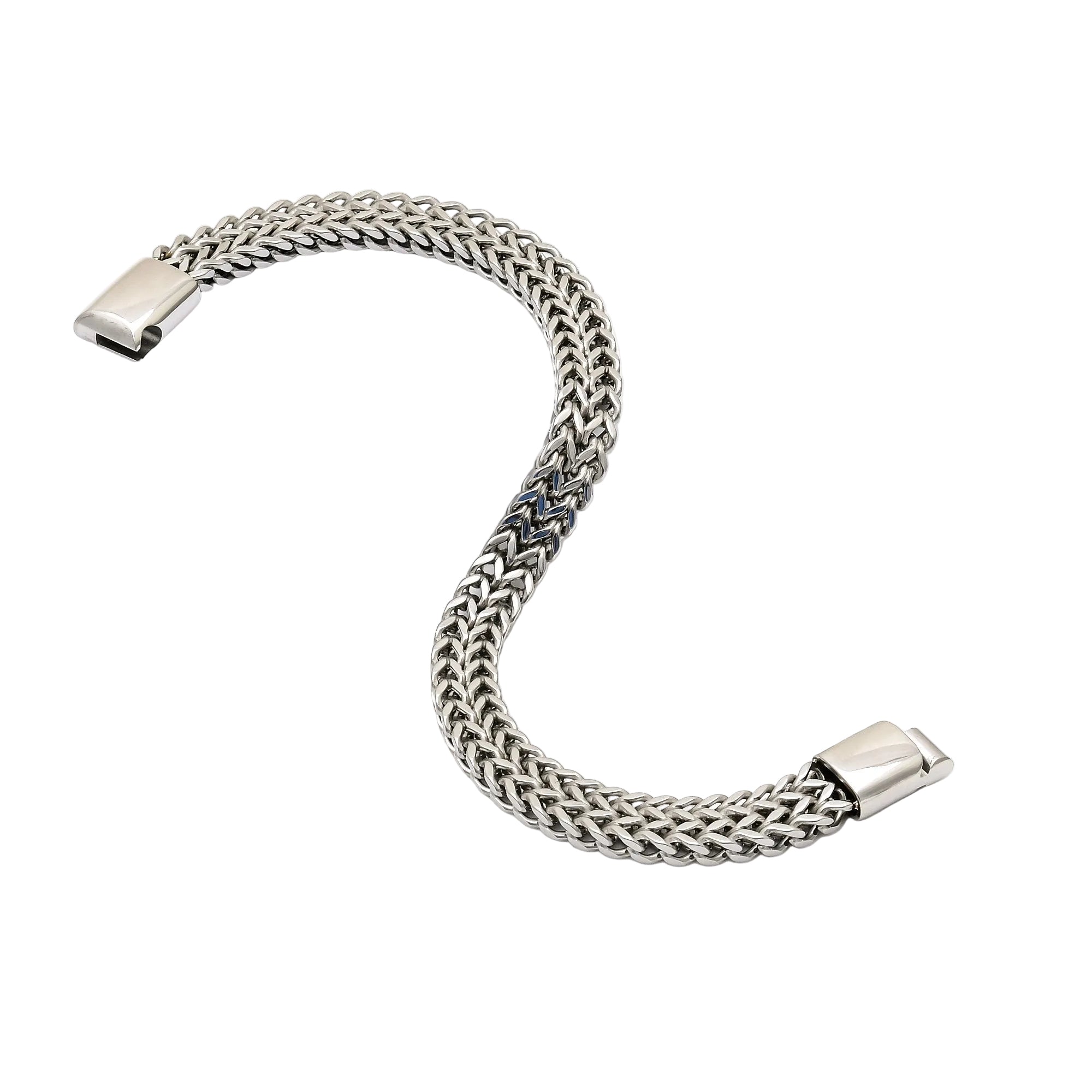 Silver chain bracelet on a white geometric base