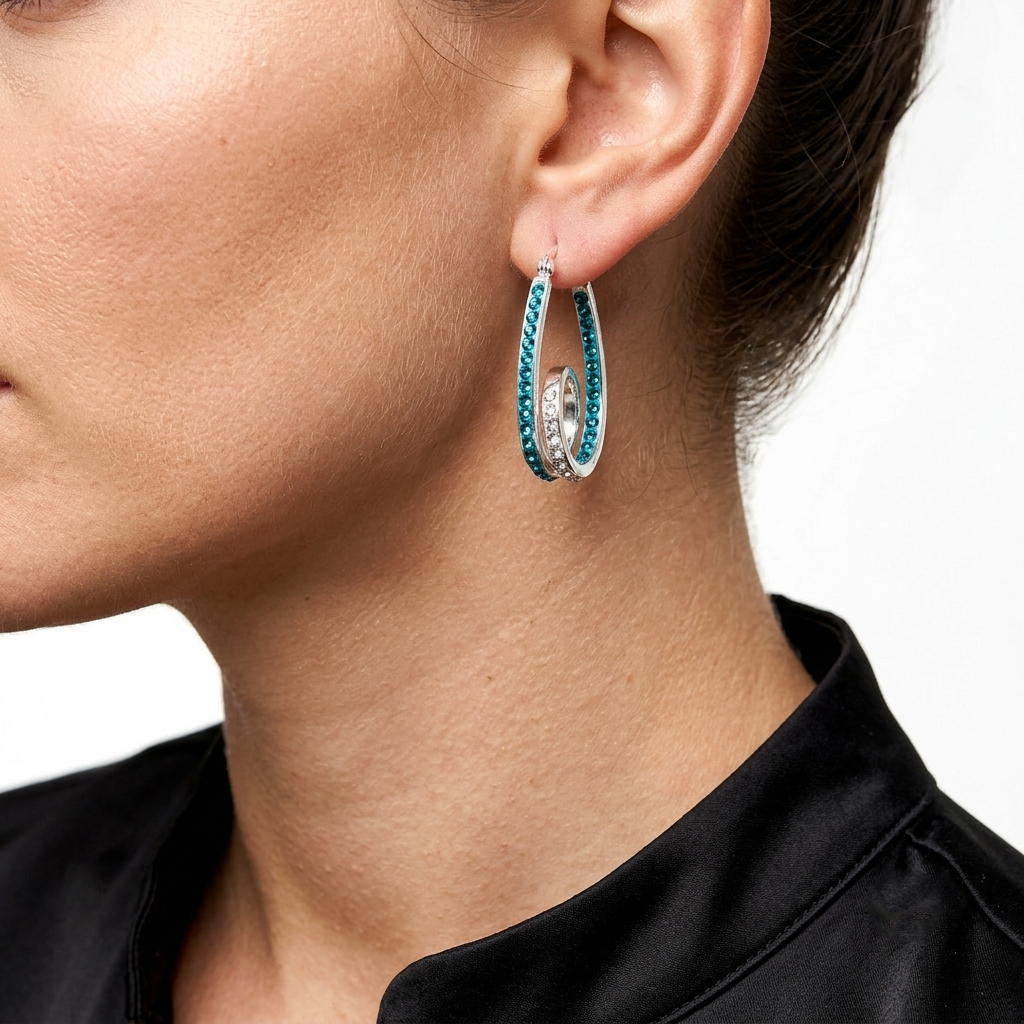 Model wearing blue crystal double hoop statement earrings