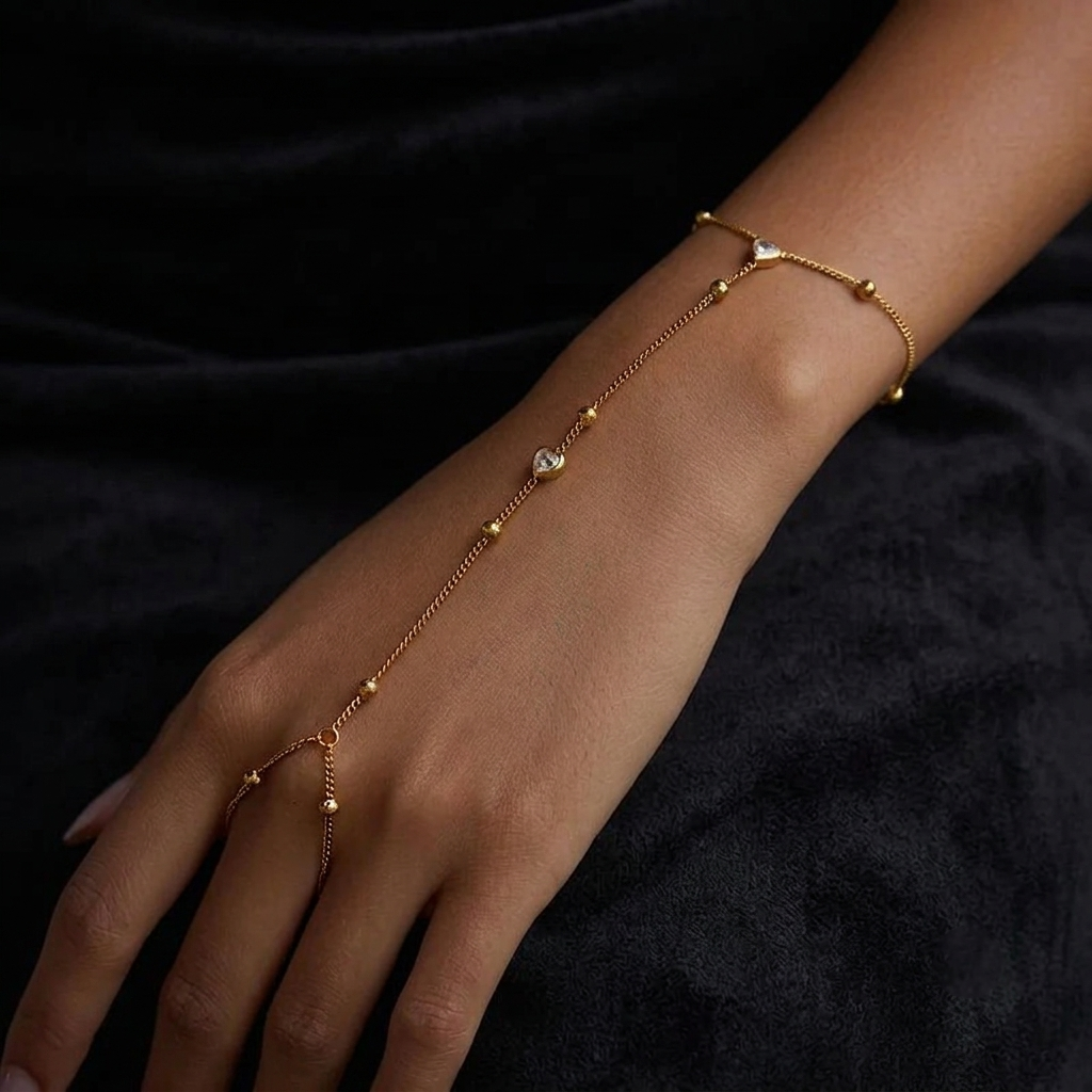 Minimal gold finger bracelet with heart pendant design for women by civaro