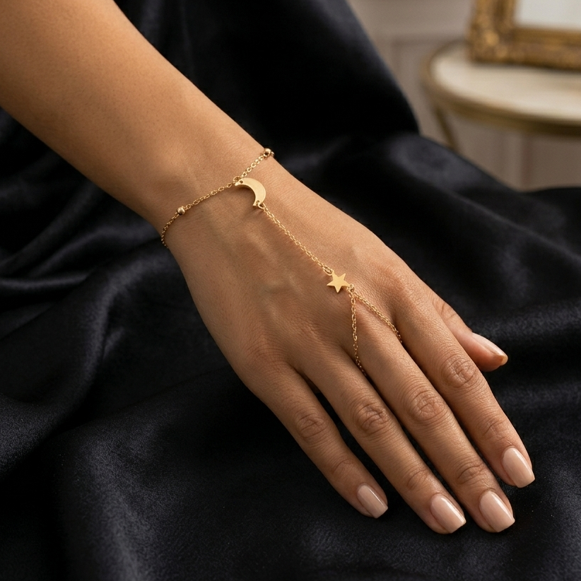 Model wearing celestial moon and star hand chain