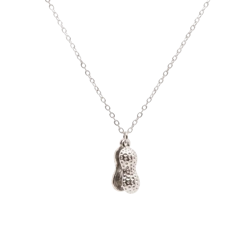Peanut Pearl Locket in stainless steel, captured in its closed, textured exterior form