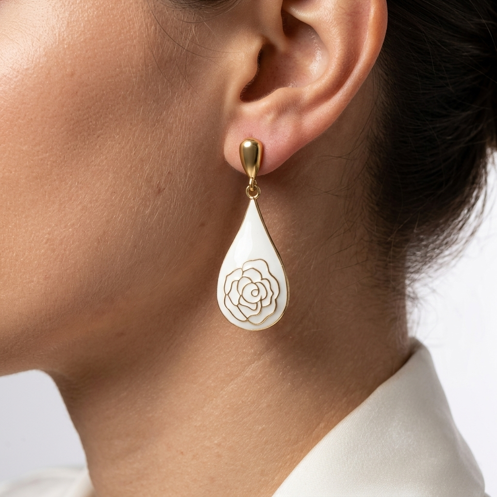 Model wearing the white Alabaster Rose teardrop earrings to showcase their elegant drape and scale