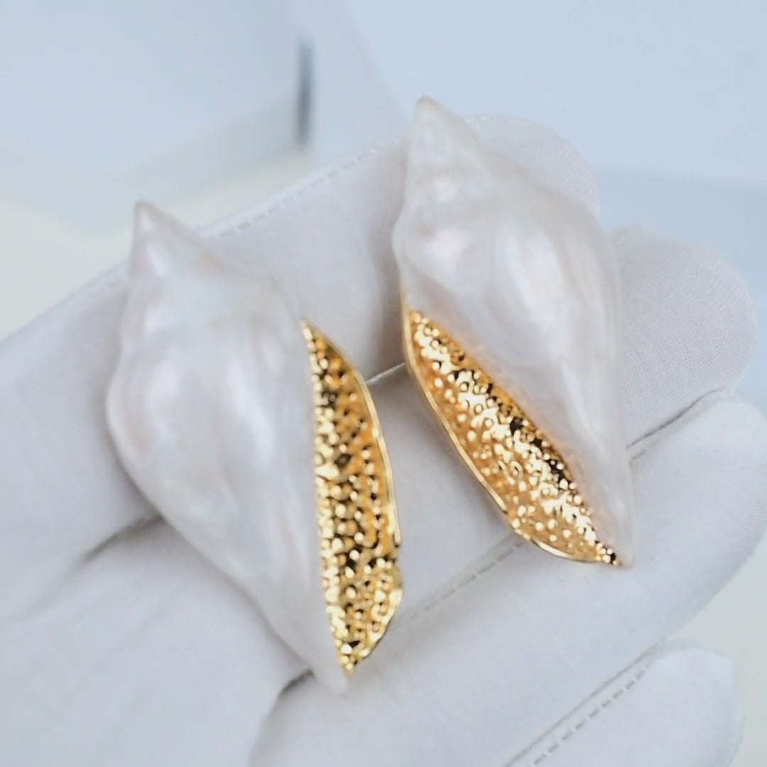 Luxury shell-shaped stud earrings in ivory and gold made from premium brass and alloy, perfect for weddings, vacations, and elegant outfits.