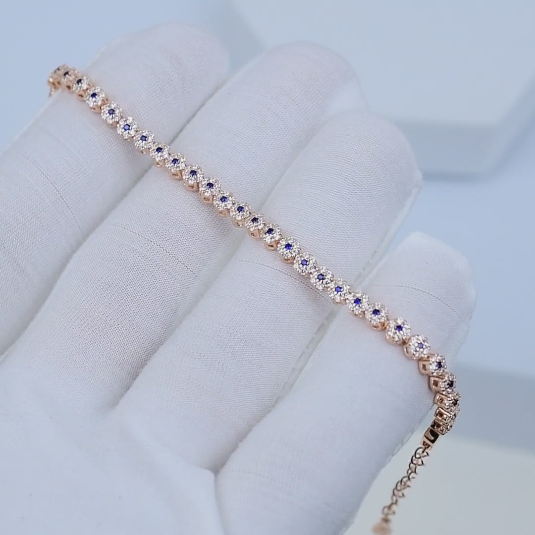 Video showcasing Celeste Blue Tennis Bracelet with blue and white stones in rose gold finished sterling silver