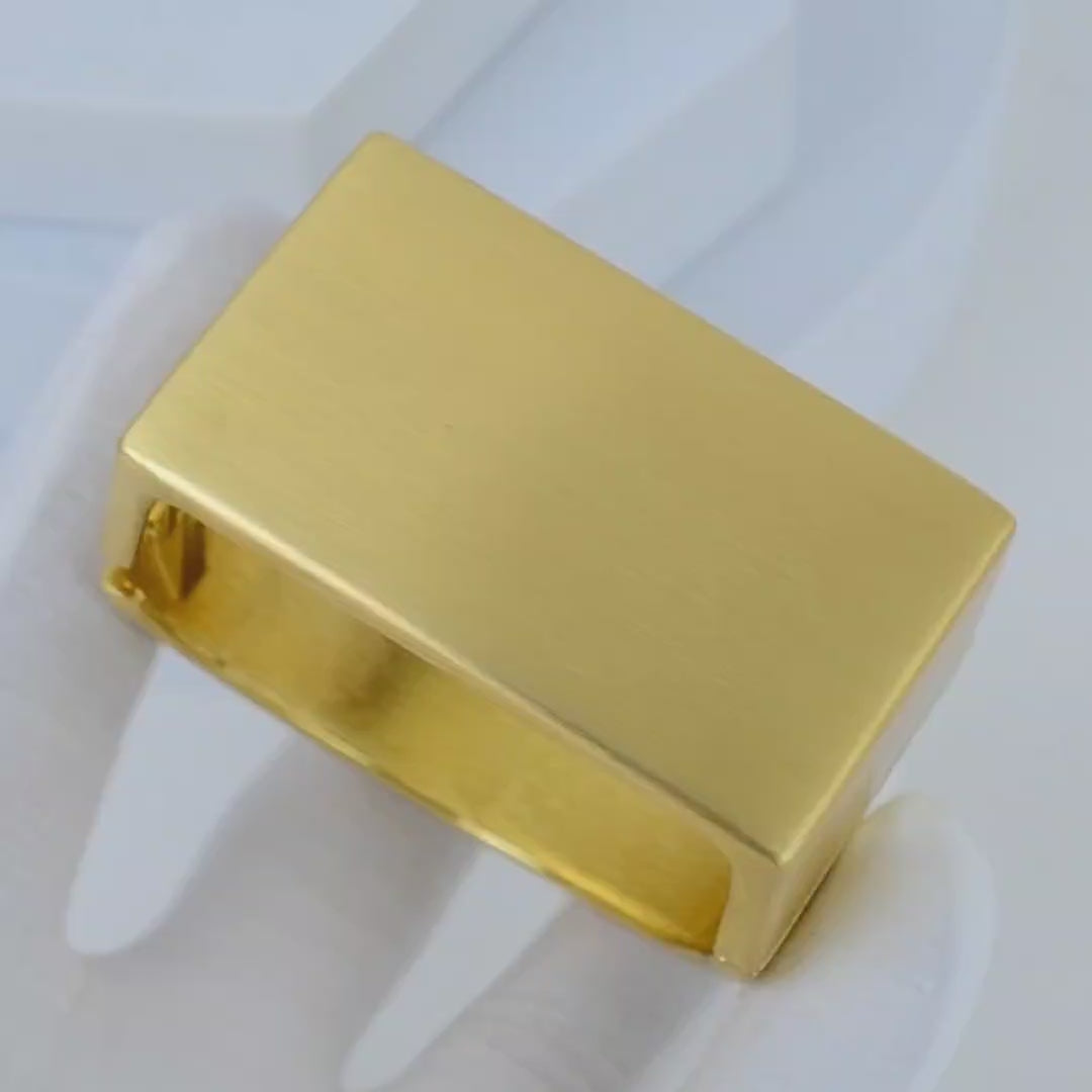 Video showcasing the handcrafted structural detail, seamless hinge movement, and the refined matte gold luster of the Signature Architectural cuff