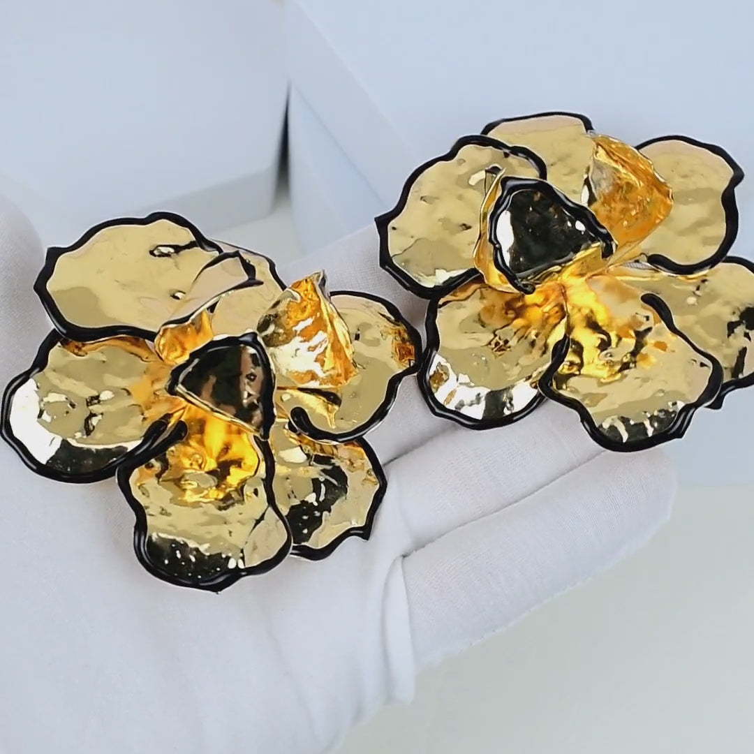 Modern handcrafted floral earrings designed for fashion-forward outfits.