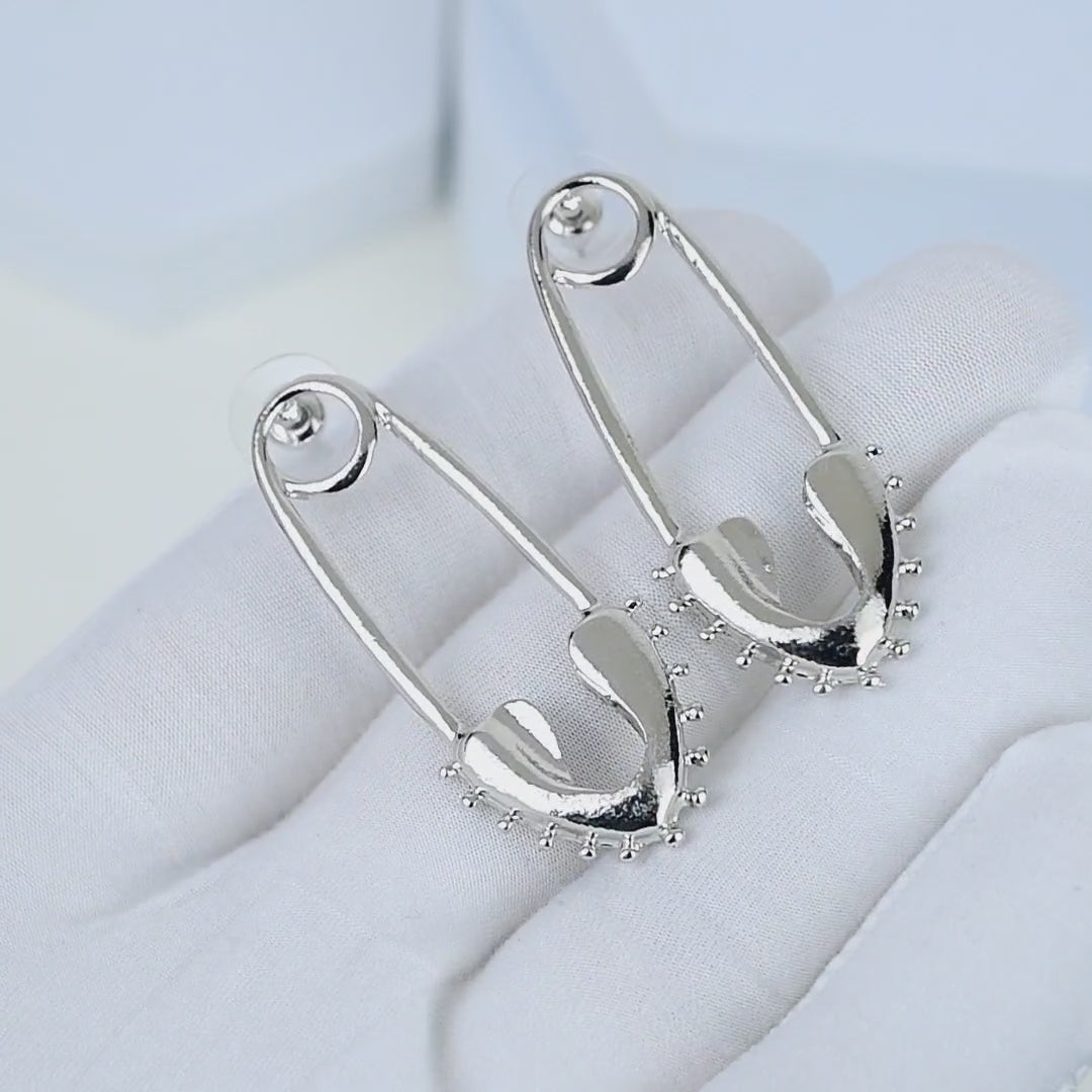     Minimalist stainless steel earrings perfect for gifting and modern fashion lovers.