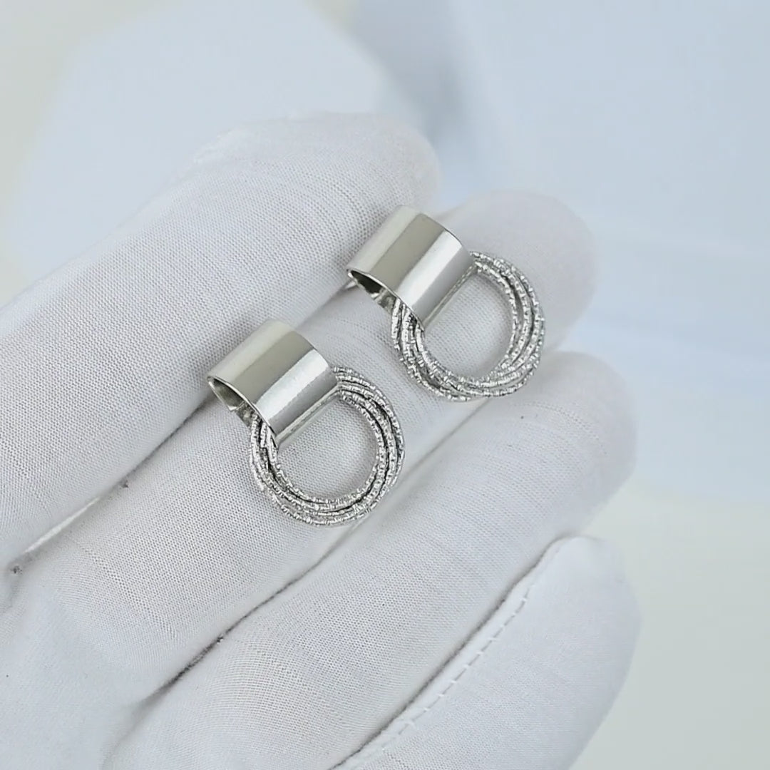 Silver tone minimal drop earrings with layered circle design for women by civaro