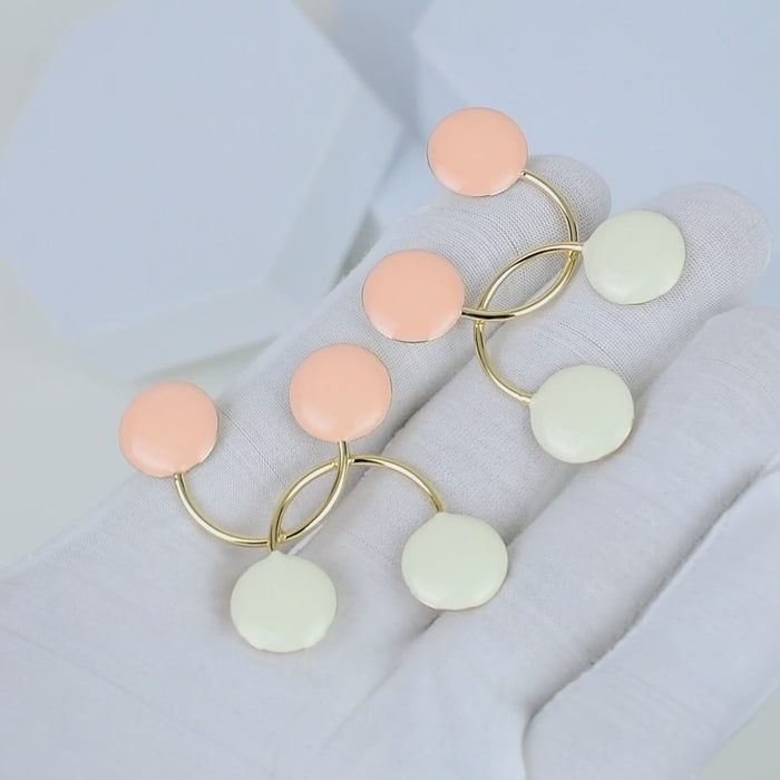 Women's pastel enamel earrings with polished gold tone stainless steel in a modern geometric silhouette by Civaro.
