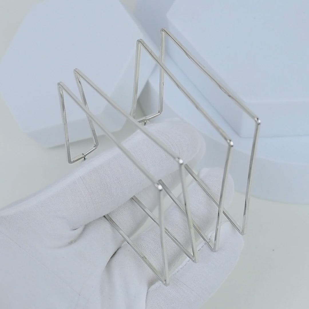Modern rectangle statement earrings made from premium stainless steel with a polished silver finish by Civaro.