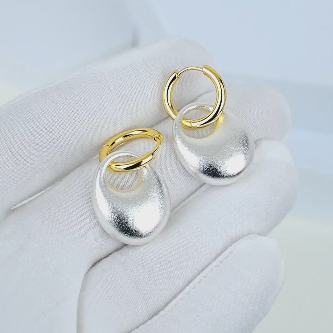 Gold and silver stainless steel hoop earrings by Civaro 
