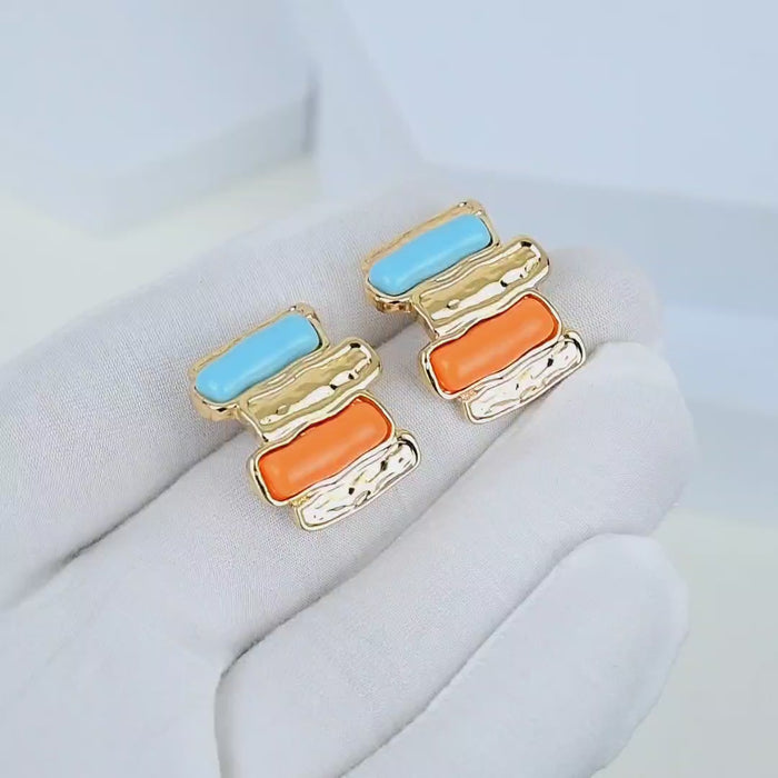 Contemporary stainless steel gold stud earrings for casual and dressy outfits.