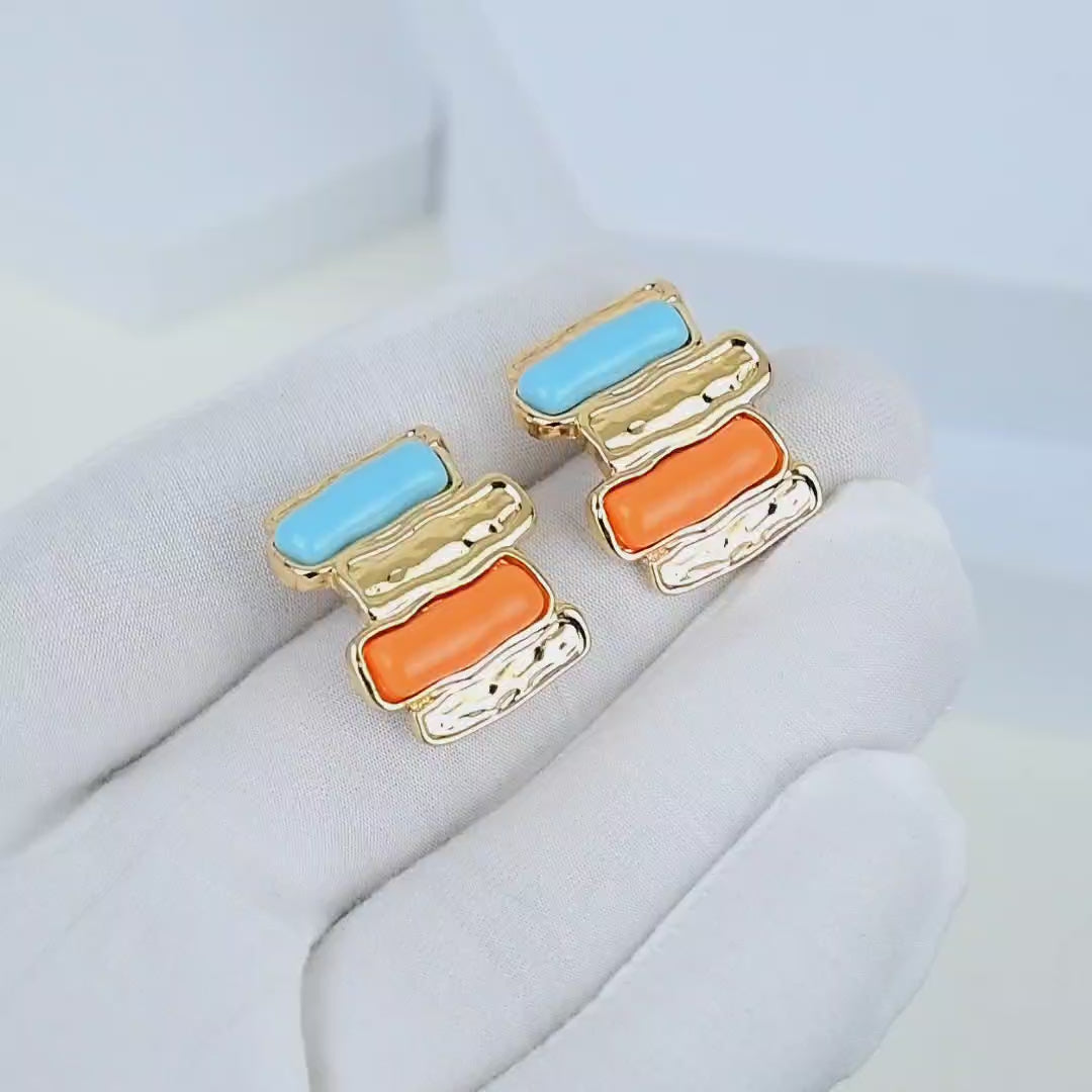 Contemporary stainless steel gold stud earrings for casual and dressy outfits.