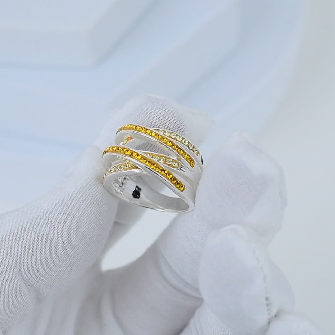 Video showcasing the intricate handcrafted details, fluid movement of the crisscross design, and the warm, light-catching radiance of the Signature Citrine Crossover ring